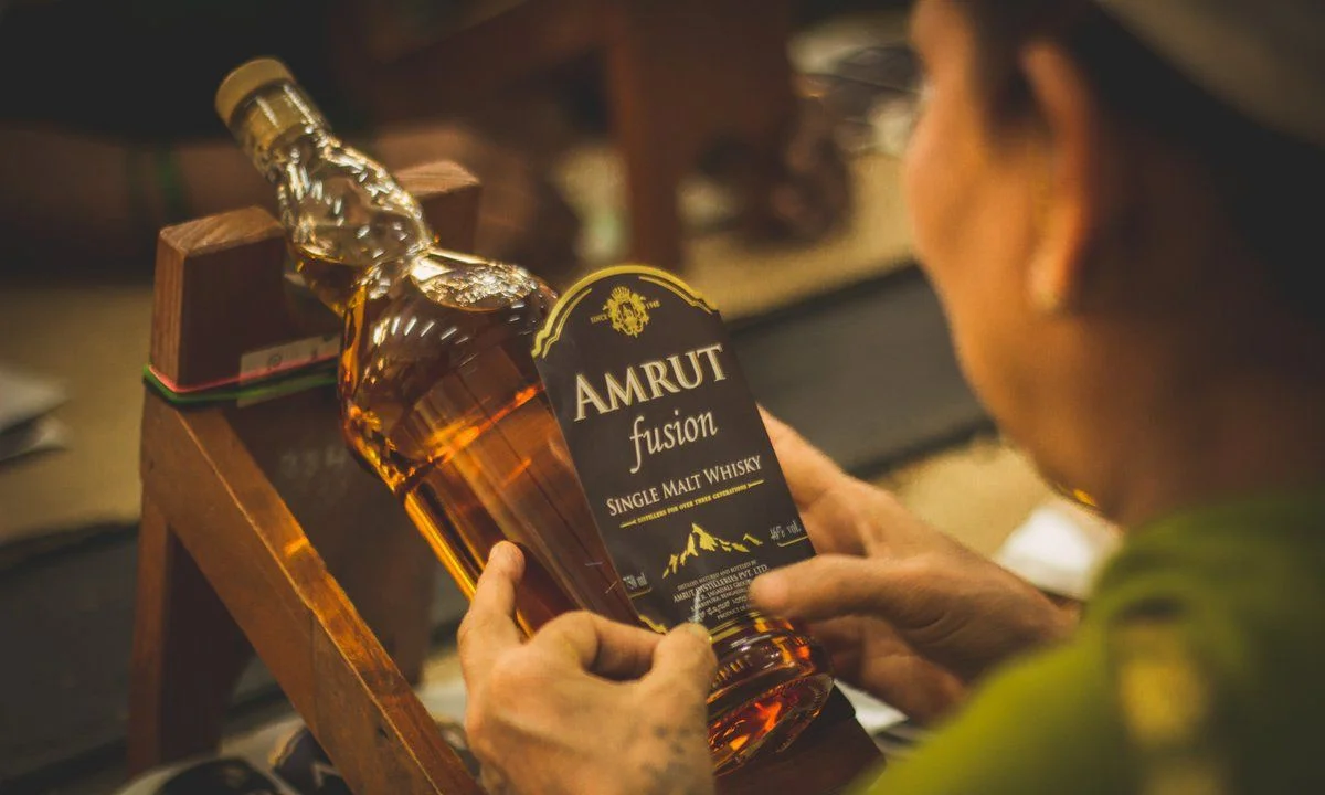 Premium Indian single malts like Amrut and Indri leading whisky sales, outselling global brands with luxury bottles priced at ₹10 lakh.